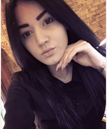 Оля